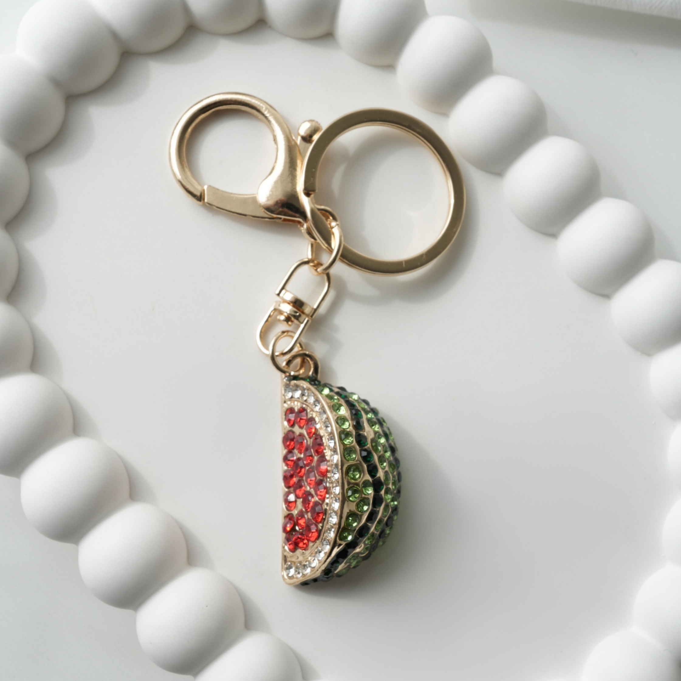 Melon Keychain with red Crystal Details